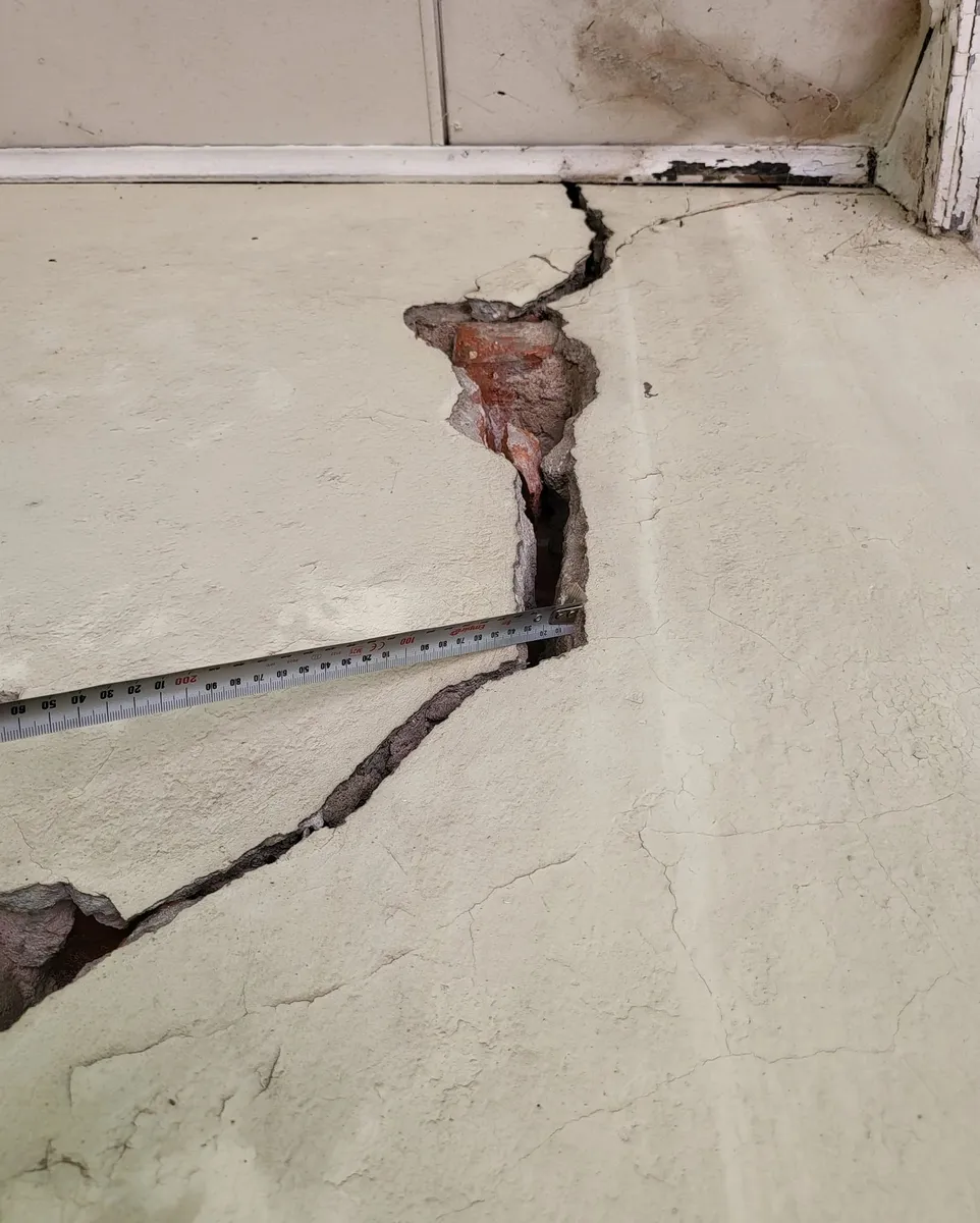 Concrete cracking documented during a building inspection