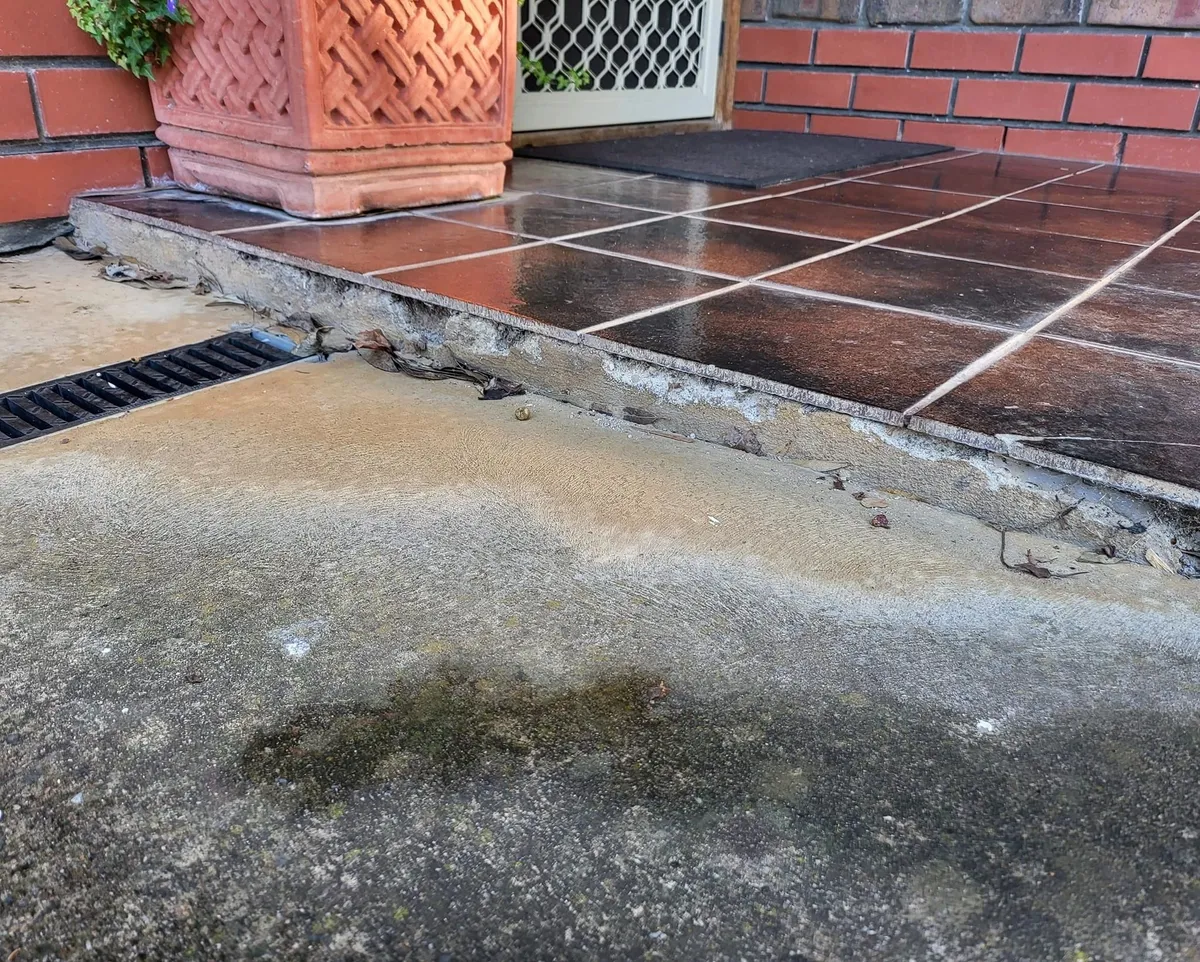 Exterior paving and brickwork checked during inspection