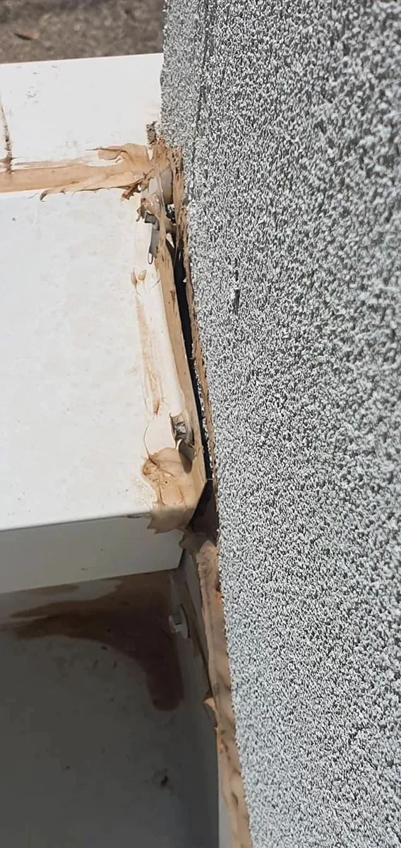 Cracking to a rendered column noted during a building inspection