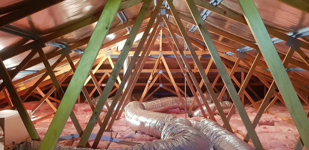 Timber roof framing checked from inside the roof void