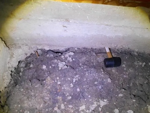 Poor subfloor drainage eroding ground beneath the footings, found during a building inspection